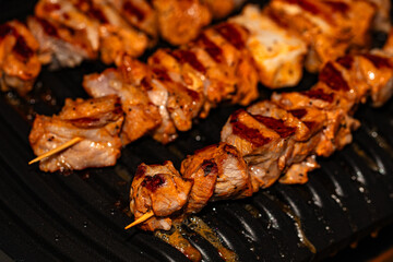 Closeup of meat prepared on electric grill