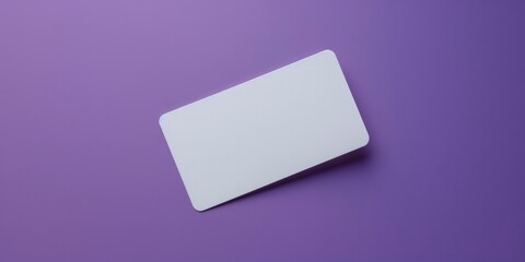 a rectangular blank white paper with shadow on purple background