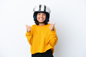 Woman with a motorcycle helmet with thumbs up gesture and smiling