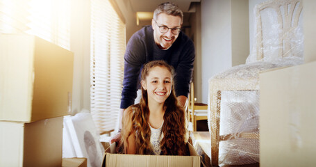 Property, box or father and daughter in new house with pushing, games and investment celebration....