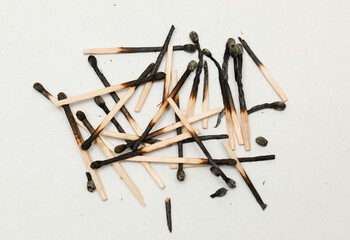 Burnt matches, group on white background