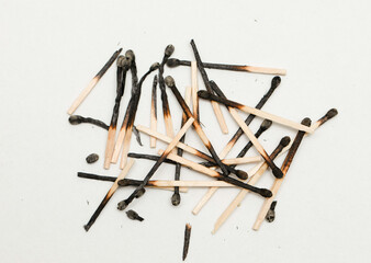 Burnt matches, group on white background
