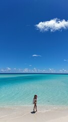 The girl enjoys relaxing on the ocean.