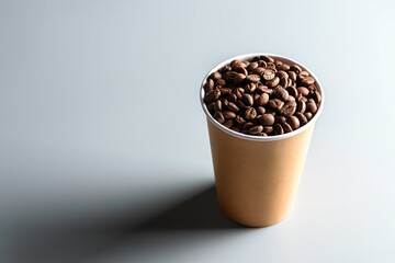 A plastic glass with coffee grains on a black background.