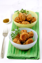 Fish balls with curry.