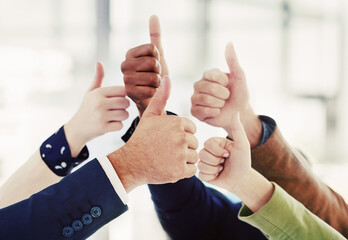 Hands, success and thumbs up with business people in office together for collaboration, support or...