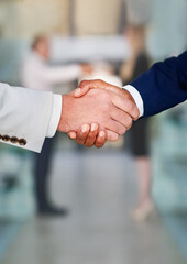 Business people, shaking hands and teamwork deal or agreement for b2b merger, investment or partnership. Collaboration, welcome and financial service at company or promotion, job interview or hello