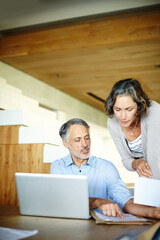 Home, senior couple and laptop with documents, conversation and online reading with connection or planning for retirement. Apartment, computer or man with woman or tech with website info or paperwork