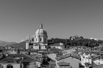 Vintage black and white photo of historic heart of Brescia, the Cathedral dome commanding the...