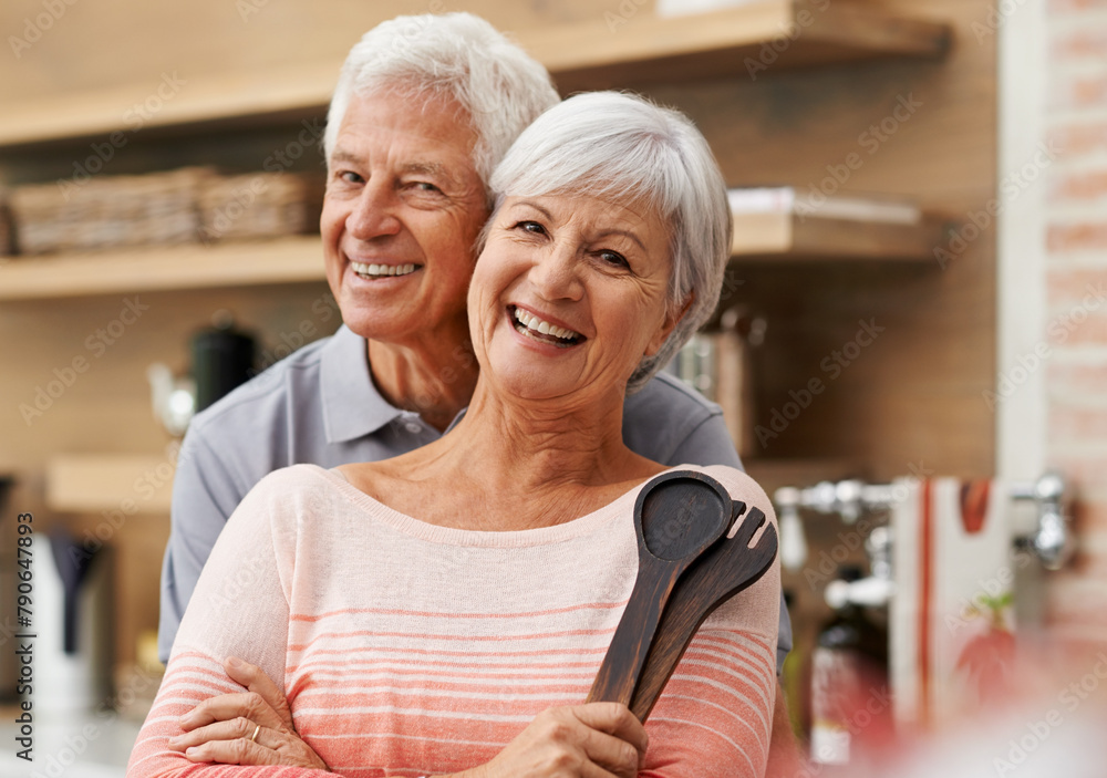 Wall mural Elderly, couple and happiness with kitchen tools for love, commitment and health in apartment for retirement. Mature man, woman and cooking together in house for lunch, marriage and senior partner.