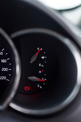 Car, dashboard and zoom of gauge of motor vehicle for petrol, temperature and speed limit for drive...