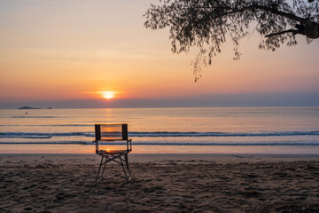 camping chairs on the beach with beautiful sea and sunrise sky, Horizon over the water.