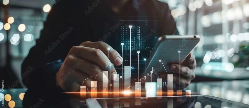 Poster Closeup businessman using mobile smart phone and icon data with growth graph analysis of business.