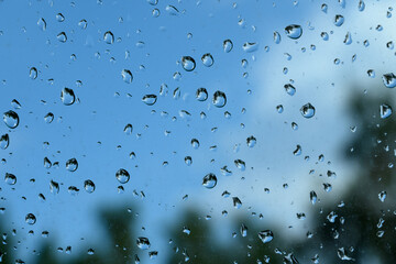 spring rain drops on car glass