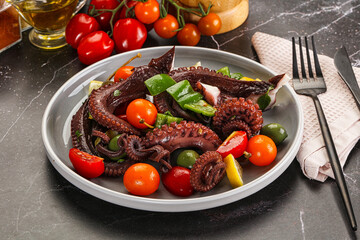 Salad with octopus tentacle and vegetables