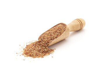 Front view of a wooden scoop filled with Organic Flaxseed Flour (Linum usitatissimum). Isolated on a white background. - obrazy, fototapety, plakaty