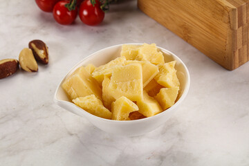 Crushed parmesan cheese in the bowl