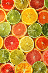 Obraz premium Vibrant Citrus Fruit Slices Background 