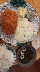 Japanese Pork Katsu Lunch Set Arranged on Dining Table.