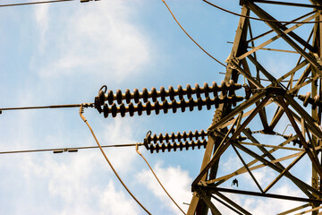 High voltage post, high voltage transmission line with sky background.High voltage post, high...