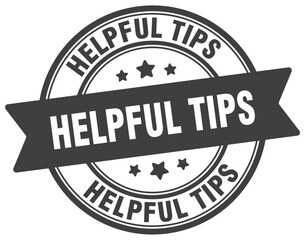 helpful tips stamp. helpful tips label on transparent background. round sign