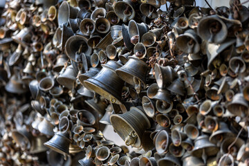 Bells on the wall. - Jhooladevi temple Ranikhet. It's a tradition to tie a bell here whenever the wishes made at this temple get completed.