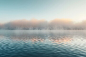 Dense fog rolling over a tranquil lake at sunrise. - obrazy, fototapety, plakaty