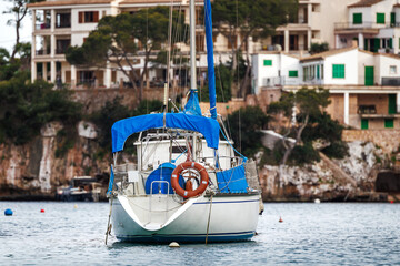 Boat in Port de Cala Figuera, Mallorca, Spain. Fishing village in Balearic islands. Anchored sailboat in sea port