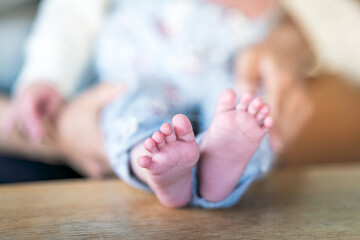 newborn baby girls feet. - 790704825