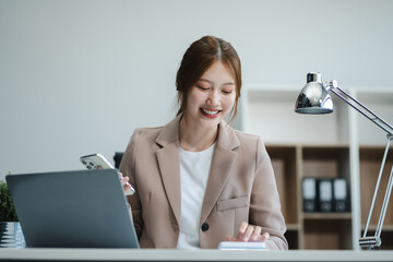 young business woman look at laptop screen calculate expenses expenditures pay bills taxes online...