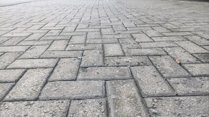 gray stone block paving. stone road, background of gray stone