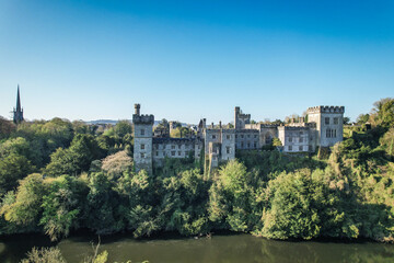Aerial view of Lismore Castle, County Waterford, Ireland, on a tranquil spring day under a flawless...