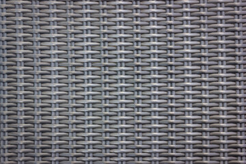 Texture of chair made from woven plastic or ratan for background 