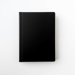 Closed black hardcover notebook isolated on a white background