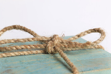 Jute String Bown on Green Wooden Box