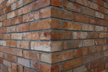 Fragment of a red brick wall