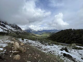 Tseylomsky pass in Ingushetia. A trip uphill to the Tsei Loam pass on a cloudy spring day. Panorama...
