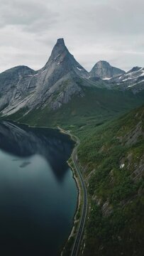 Aerial view - road to Stetind mountain in Norway landscape scandinavian nature beautiful travel destinations, vertical video