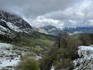 Tseylomsky pass in Ingushetia. A trip uphill to the Tsei Loam pass on a cloudy spring day. Panorama...