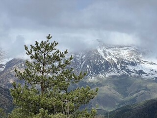 Tseylomsky pass in Ingushetia. A trip uphill to the Tsei Loam pass on a cloudy spring day. Panorama...