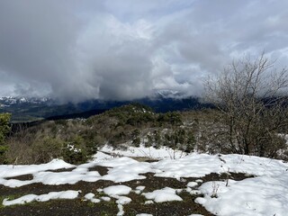 Tseylomsky pass in Ingushetia. A trip uphill to the Tsei Loam pass on a cloudy spring day. Panorama...