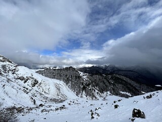 Tseylomsky pass in Ingushetia. A trip uphill to the Tsei Loam pass on a cloudy spring day. Panorama...
