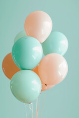 A bunch of balloons in muted colors, such as peach and mint green, float against an isolated light blue background