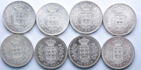 Reverse of 4 silver 500 reis coins from King Carlos I of Portugal. On the face the weapons of the...