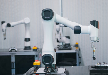 A robot is working on a piece of machinery