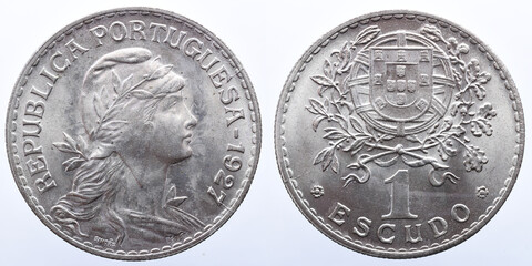 Portuguese 1 escudoalpaca coin. On the obverse the bust of the republic and the year of minting. on the reverse the value of 1 escudo and the coat of arms - obrazy, fototapety, plakaty