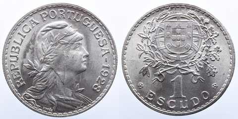 Portuguese 1 escudoalpaca coin. On the obverse the bust of the republic and the year of minting. on...