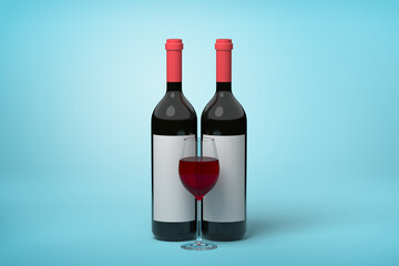 Two red wine bottles and glass on blue
