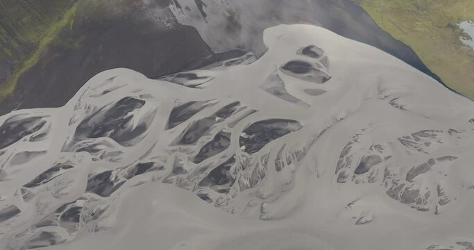 Aerial Panning Full Frame Of Braided River Streams Flowing On Landscape - Unknown, Iceland
