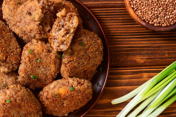 Healthy vegetarian food background photo . Fried buckwheat cutlets